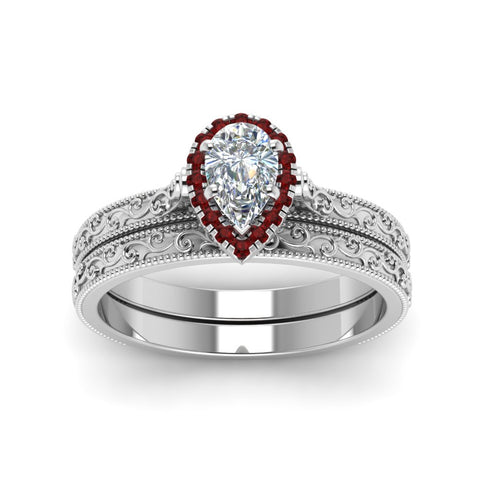 hand-engraved-pear-shaped-halo-diamond-wedding-ring-set-with-ruby-in-white-gold-FD8588PEGRUDRANGLE5-NL-WG_b3c72ba5-5afa-4065-afe5-7490accb469b?v=1757665372
