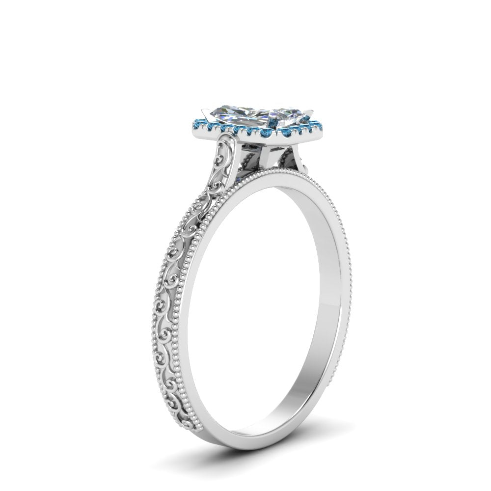 hand-engraved-radiant-cut-halo-diamond-engagement-ring-with-blue-topaz-in-white-gold-FD8588RARGICBLTOANGLE2-NL-WG?v=1757588450