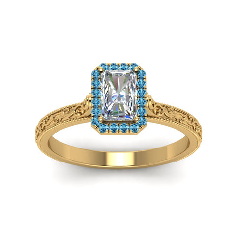 hand-engraved-radiant-cut-halo-diamond-engagement-ring-with-blue-topaz-in-yellow-gold-FD8588RARGICBLTOANGLE5-NL-YG?v=1757588451