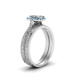 Load image into Gallery viewer, hand-engraved-radiant-cut-halo-diamond-wedding-ring-set-with-blue-topaz-in-white-gold-FD8588RAGICBLTOANGLE2-NL-WG?v=1757665273
