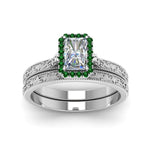 Load image into Gallery viewer, hand-engraved-radiant-cut-halo-diamond-wedding-ring-set-with-emerald-in-white-gold-FD8588RAGEMGRANGLE5-NL-WG_8c1ef492-1b5d-45f2-b4a4-4cd652a3a5b4?v=1757665393
