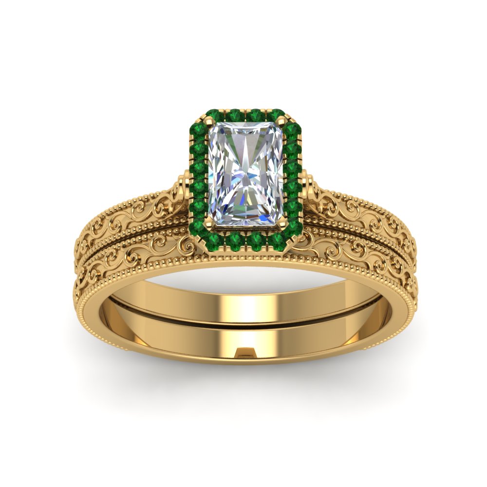 hand-engraved-radiant-cut-halo-diamond-wedding-ring-set-with-emerald-in-yellow-gold-FD8588RAGEMGRANGLE5-NL-YG_865cb45d-f872-49af-911b-51676ea66a5c?v=1757665393