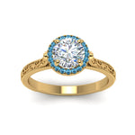Load image into Gallery viewer, hand-engraved-round-cut-halo-diamond-engagement-ring-with-blue-topaz-in-yellow-gold-FD8588RORGICBLTOANGLE5-NL-YG?v=1757588582
