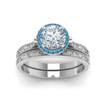 Load image into Gallery viewer, hand-engraved-round-cut-halo-diamond-wedding-ring-set-with-blue-topaz-in-white-gold-FD8588ROGICBLTOANGLE5-NL-WG_d85d996f-e361-4b4e-9f83-d49133ba32f0?v=1757665404
