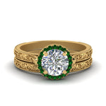 Load image into Gallery viewer, hand-engraved-round-cut-halo-diamond-wedding-ring-set-with-emerald-in-yellow-gold-FD8588ROGEMGR-NL-YG_341d0d9d-ccc7-43ac-b2e9-a15b5fcd0149?v=1757665404
