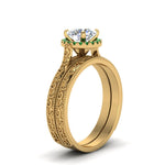 Load image into Gallery viewer, hand-engraved-round-cut-halo-diamond-wedding-ring-set-with-emerald-in-yellow-gold-FD8588ROGEMGRANGLE2-NL-YG_7ff9684d-299f-4006-82e7-5a1100764c50?v=1757665404
