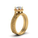 Load image into Gallery viewer, hand-engraved-round-cut-halo-diamond-wedding-ring-set-with-orange-sapphire-in-yellow-gold-FD8588ROGSAORANGLE2-NL-YG_7cdc6c0e-67da-4207-b14c-ff480bcb21fe?v=1757665403

