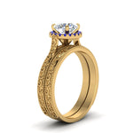 Load image into Gallery viewer, hand-engraved-round-cut-halo-diamond-wedding-ring-set-with-sapphire-in-yellow-gold-FD8588ROGSABLANGLE2-NL-YG?v=1757665292