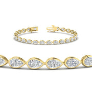 handcrafted-bezel-set-pear-diamond-bracelet-in-yellow-gold-FDBRCPE10581ANGLE2-6.50CT-NL-YG_6d941e5a-3d0e-4049-8413-0c8f41f752ac.jpg?v=1776851151