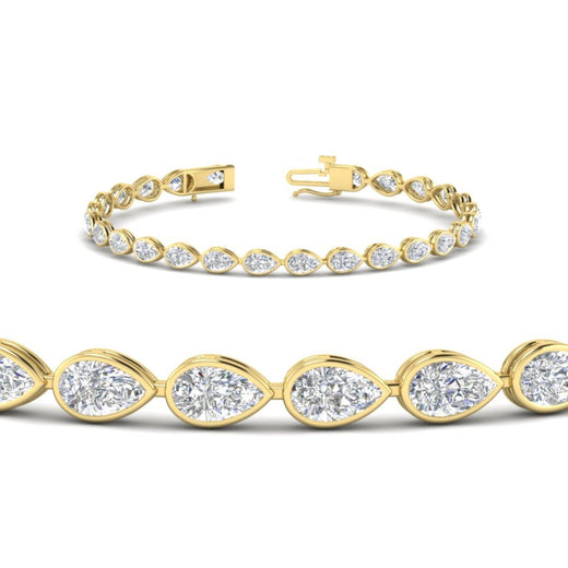 handcrafted-bezel-set-pear-diamond-bracelet-in-yellow-gold-FDBRCPE10581ANGLE2-6.50CT-NL-YG_6d941e5a-3d0e-4049-8413-0c8f41f752ac.jpg?v=1776851151