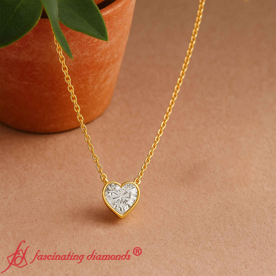 heart-diamond-bezel-solitaire-necklace-in-yellow-gold-fdpd10538ht-1-00ct-fancy1-nl-yg