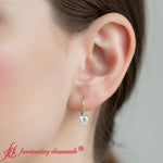 Load image into Gallery viewer, heart-diamond-solitaire-earrings-1-carat-leverback-in-white-gold-FD-EAR9225HT-model
