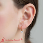 Load image into Gallery viewer, heart-diamond-solitaire-earrings-1-carat-leverback-in-yellow-gold-FD-EAR9225HT-model
