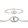 Load image into Gallery viewer, heart-interlocked-blue-topaz-bracelet-in-rose-gold-FDBRC8649HTGICBLTOANGLE1-NL-RG