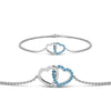 Load image into Gallery viewer, heart-interlocked-blue-topaz-bracelet-in-white-gold-FDBRC8649HTGICBLTOANGLE1-NL-WG