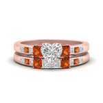 Load image into Gallery viewer, heart-shaped-channel-three-stone-diamond-engagement-ring-with-orange-sapphire-in-rose-gold-FDENS205HTGSAOR-NL-RG.jpg
