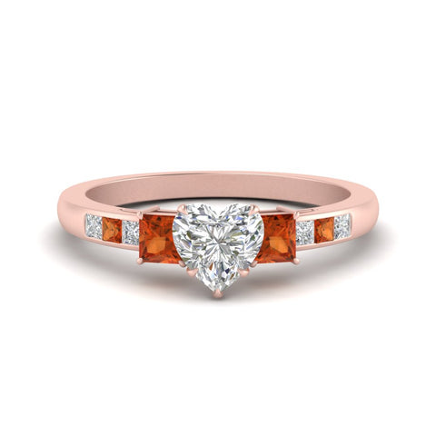 heart-shaped-channel-three-stone-diamond-engagement-ring-with-orange-sapphire-in-rose-gold-FDENS205HTRGSAOR-NL-RG.jpg
