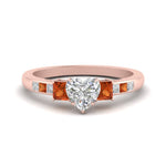 Load image into Gallery viewer, heart-shaped-channel-three-stone-diamond-engagement-ring-with-orange-sapphire-in-rose-gold-FDENS205HTRGSAOR-NL-RG.jpg
