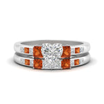 Load image into Gallery viewer, heart-shaped-channel-three-stone-diamond-engagement-ring-with-orange-sapphire-in-white-gold-FDENS205HTGSAOR-NL-WG.jpg
