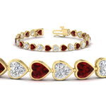 Load image into Gallery viewer, heart-shaped-diamond-bezel-tennis-bracelet-10-40-carat-with-ruby-in-yellow-gold-fdbrc10581htgrudrangle2-10-40-ct-nl-yg
