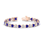 Load image into Gallery viewer, heart-shaped-diamond-bezel-tennis-bracelet-10-40-carat-with-sapphire-in-rose-gold-fdbrc10581htgsablangle2-10-40-ct-nl-rg
