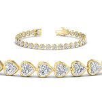 Load image into Gallery viewer, heart-shaped-diamond-bezel-tennis-bracelet-7-75-carat-in-yellow-gold-fdbrc10581htangle2-7-75-ct-nl-yg
