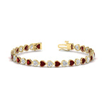 Load image into Gallery viewer, heart-shaped-diamond-bezel-tennis-bracelet-7-75-carat-with-ruby-in-yellow-gold-fdbrc10581htgrudrangle2-7-75-ct-nl-yg
