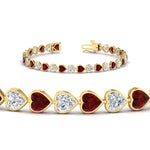Load image into Gallery viewer, heart-shaped-diamond-bezel-tennis-bracelet-7-75-carat-with-ruby-in-yellow-gold-fdbrc10581htgrudrangle2-7-75-ct-nl-yg
