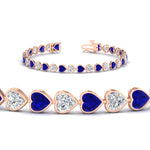 Load image into Gallery viewer, heart-shaped-diamond-bezel-tennis-bracelet-7-75-carat-with-sapphire-in-rose-gold-fdbrc10581htgsablangle2-7-75-ct-nl-rg
