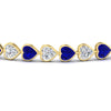 Load image into Gallery viewer, heart-shaped-diamond-bezel-tennis-bracelet-7-75-carat-with-sapphire-in-yellow-gold-fdbrc10581htgsablangle2-7-75-ct-nl-yg