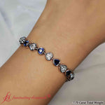 Load image into Gallery viewer, heart-shaped-diamond-bezel-tennis-bracelet-with-sapphire-in-white-gold-fdbrc10581ht-7-75-ct-fancy1-nl-wg
