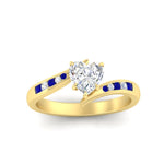 Load image into Gallery viewer, heart-shaped-diamond-swirl-channel-set-sapphire-wedding-ring-in-yellow-gold-FDENS4028HTRGSABLANGLE5-NL-YG.jpg?v=1754995896
