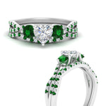 Load image into Gallery viewer, heart-shaped-twisted-floral-prong-emerald-wedding-set-in-white-gold-FD10257HTGEMGR-ANGLE3-NL-WG?v=1756359990
