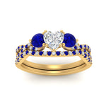 Load image into Gallery viewer, heart-shaped-twisted-floral-prong-sapphire-wedding-set-in-yellow-gold-FD10257HTGSABL-ANGLE5-NL-YG_da085d24-3686-4606-b7b2-baa426935989?v=1756360128
