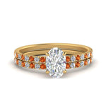 Load image into Gallery viewer, hidden-halo-half-way-oval-shaped-diamond-wedding-ring-set-with-orange-sapphire-in-FD9168OVGSAORANGLE3-NL-YG
