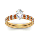 Load image into Gallery viewer, hidden-halo-half-way-oval-shaped-diamond-wedding-ring-set-with-orange-sapphire-in-FD9168OVGSAORANGLE3-NL-YG
