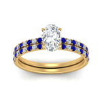Load image into Gallery viewer, hidden-halo-half-way-oval-shaped-diamond-wedding-ring-set-with-sapphire-in-FD9168OVGSABLANGLE3-NL-YG
