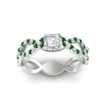 Load image into Gallery viewer, https://cdn.fascinatingdiamonds.com/FD11157/infinity-asscher-cut-twist-diamond-engagement-ring-with-emerald-in-white-gold-FD11157ASRGEMGRHAND-NL-WG.jpg
