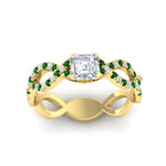 Load image into Gallery viewer, https://cdn.fascinatingdiamonds.com/FD11157/infinity-asscher-cut-twist-diamond-engagement-ring-with-emerald-in-yellow-gold-FD11157ASRGEMGRHAND-NL-YG.jpg
