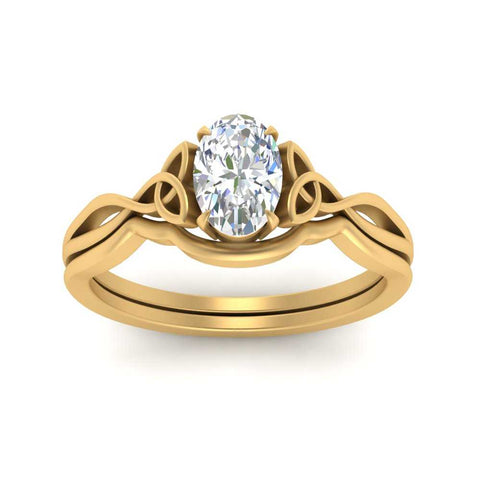 infinity-celtic-oval-shaped-solitaire-wedding-set-in-yellow-gold-FD9286OVANGLE5-NL-YG-B1?v=1755772256