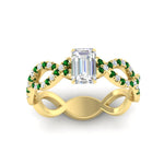 Load image into Gallery viewer, infinity-emerald-cut-twist-diamond-engagement-ring-with-emerald-in-yellow-gold-FD11157EMRGEMGRANGLE3-NL-YG
