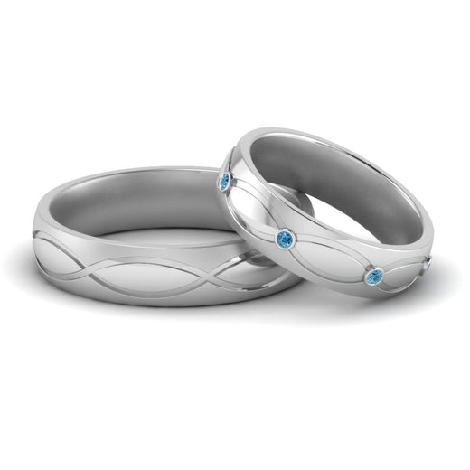 infinity-engraved-his-and-her-blue-topaz-matching-bands-in-white-gold-FD9352BGICBLTO-NL-WG.jpg