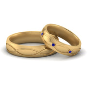 infinity-engraved-his-and-her-sapphire-matching-bands-in-yellow-gold-FD9352BGSABL-NL-YG.jpg
