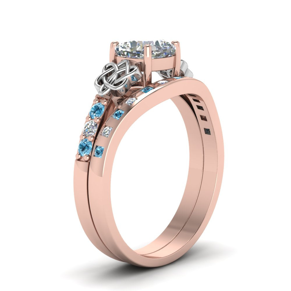 irish-cushion-cut-diamond-bridal-ring-set-with-blue-topaz-in-rose-gold-FDENS2255B4CUGICBLTOANGLE2-NL-RG_56fa4cd4-696c-4b7a-a610-5276c7cad626?v=1757052278