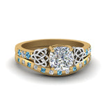Load image into Gallery viewer, irish-cushion-cut-diamond-bridal-ring-set-with-blue-topaz-in-yellow-gold-FDENS2255B4CUGICBLTO-NL-YG_823724a4-83bd-48cf-a699-1b9ccc535413?v=1757052278
