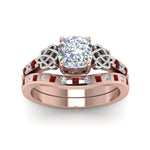 Load image into Gallery viewer, irish-cushion-cut-diamond-bridal-ring-set-with-ruby-in-rose-gold-FDENS2255B4CUGRUDRANGLE5-NL-RG_82f729f7-0c41-48dd-8e15-6042e5af93ca?v=1757052278
