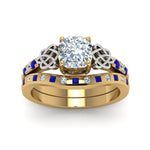 Load image into Gallery viewer, irish-cushion-cut-diamond-bridal-ring-set-with-sapphire-in-yellow-gold-FDENS2255B4CUGSABLANGLE5-NL-YG_2b1dc480-f7dc-4405-ba29-540048a6c724?v=1757052277
