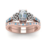 Load image into Gallery viewer, irish-emerald-cut-diamond-bridal-ring-set-with-blue-topaz-in-rose-gold-FDENS2255B4EMGICBLTOANGLE5-NL-RG_16939c99-09b8-489d-bf4f-92974090645c?v=1757052290
