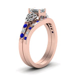 Load image into Gallery viewer, irish-emerald-cut-diamond-bridal-ring-set-with-sapphire-in-rose-gold-FDENS2255B4EMGSABLANGLE2-NL-RG_094039e3-3dde-485e-ade3-4f058cfb0a25?v=1757052291
