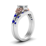 Load image into Gallery viewer, irish-emerald-cut-diamond-bridal-ring-set-with-sapphire-in-white-gold-FDENS2255B4EMGSABLANGLE2-NL-WG?v=1757052183
